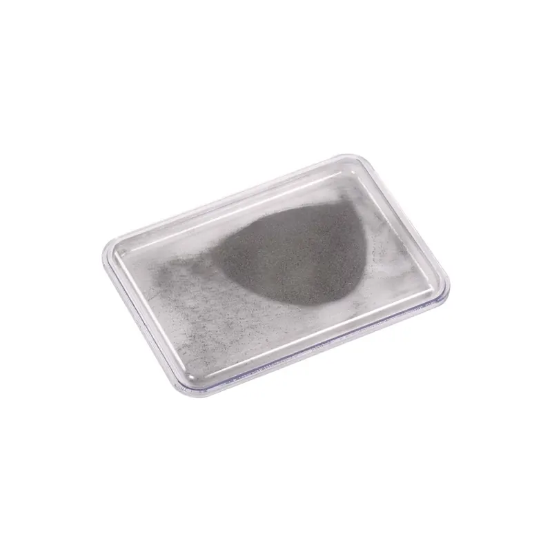 Boîte avec poudre d'acier sans aimant